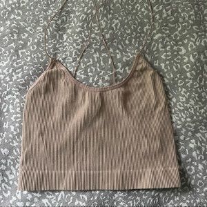 out from under sparkly nude tank top